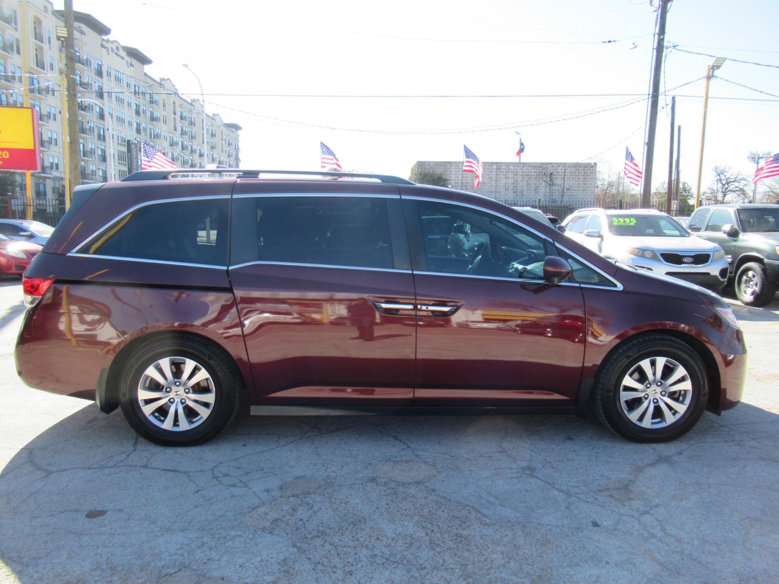 2016 Red /Tan Honda Odyssey EX-L (5FNRL5H62GB) with an 3.5L V6 SOHC 24V engine, Automatic transmission, located at 1511 North Shepherd Dr., Houston, TX, 77008, (281) 657-1221, 29.798361, -95.412560 - 2016 HONDA ODYSSEY EX-L VIN: 5FNRL5H62GB103369 5 F N R L 5 H 6 2 G B 1 0 3 3 6 9 VAN 3.5L V6 F SOHC 24V GASOLINE FRONT WHEEL DRIVE - Photo #36